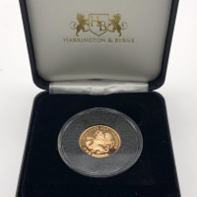 A 2015 St George & the dragon gold &pound;1 coin. (A)