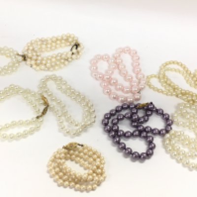 Simulated knotted pearl necklaces, postage category B