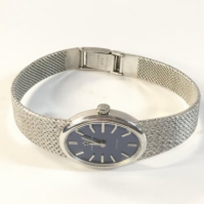 A ladies 9ct white gold cased eterna matic watch on a 9ct white gold strap.