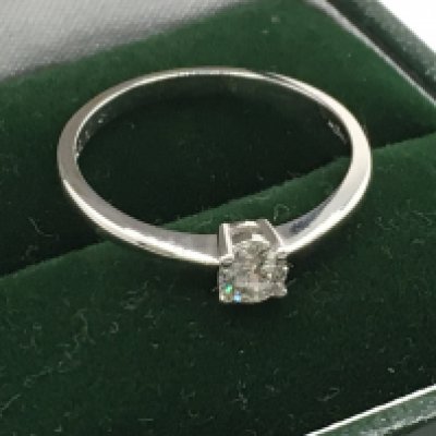 A 9ct white gold RBC diamond solitaire ring, diamond 0.25ct. Size N, 1.6g. Postage category a