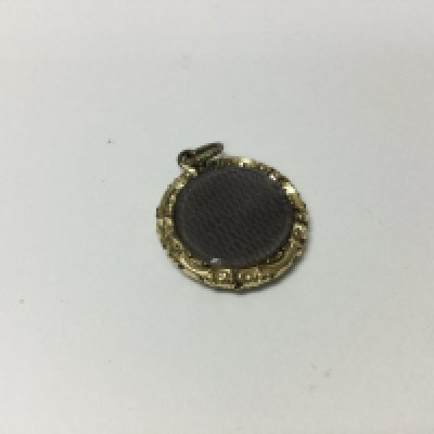 A yellow metal mourning locket. No reserve.