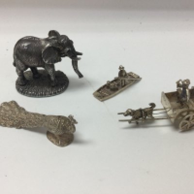 A collection of silver items.