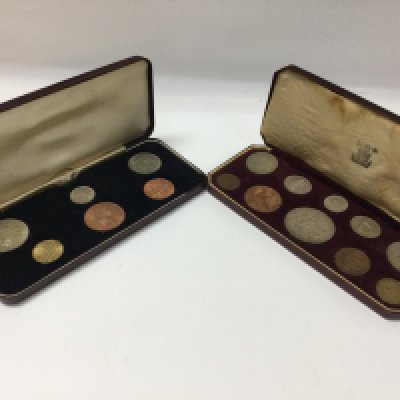A 1953 coin presentation set and 1967 specimen set.