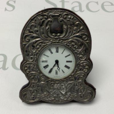 A modern hallmarked silver fronted dressing table clock. 16.5cm.