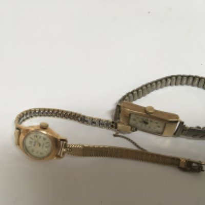 A ladies 18carat gold watch with plated strap and a 9carat gold Art Deco design ladies watch of rectangular shape not seen working. (2)