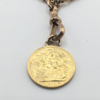 A 1910 full sovereign on a 9ct gold belcher chain. 25.3g Postage A