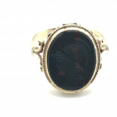 A 9ct gold ring set with Intaglio blood stone. 4.3g and size S Postage A