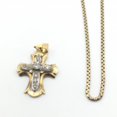 An 18ct gold cross set with diamonds 3g and a 9ct gold chain 5g. Postage A