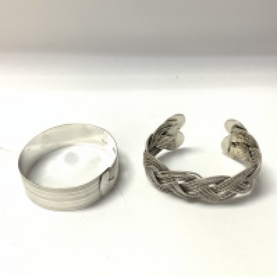 Two silver tested bangle approx 77.20 grams.