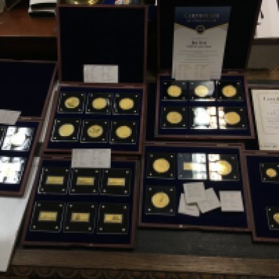 A collection of 6 cases of 1/200oz fine sheet coins etc. Postage B