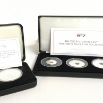 A Jubilee Mint 2020 Remembrance Day solid silver proof coin collection and Jubilee Mint 80th Anniversary of the Battle of Britain solid silver proof &#20132660835 coin. Postage category B
