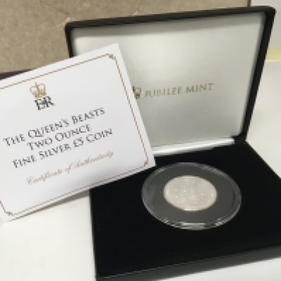 A Querns Beast silver 2018 two ounce coin The black Bull of Clarence. With certificate of Authenticity the dim in sealed Perspex case and fitted box.