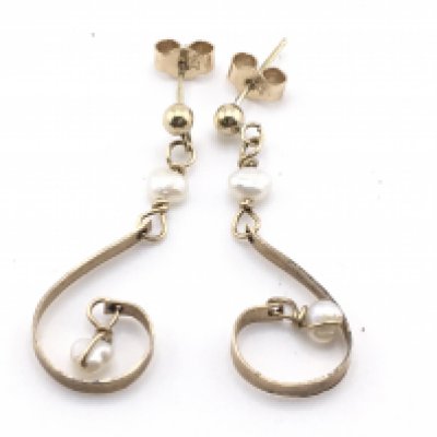 A pair of 9ct gold earrings set with seed pearl. 1.7g Postage A