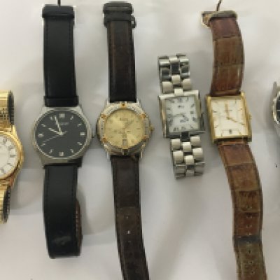 A collection of used worn gents watches Citizen day date Bulova and other watches.
