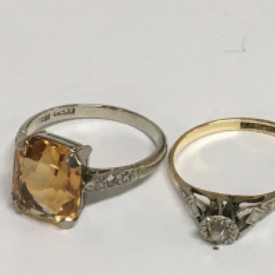 An 18carat white gold ring set with a good sized cut yellow Citrine and one other 18carat gold ring set with a small diamond. (2) total weight 5g