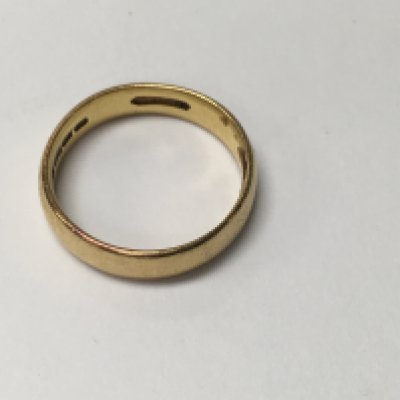 A 22ct gold wedding band ,5.5 grams.and a 18ct gold ring inset with five diamond 3 grams.