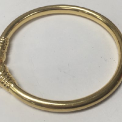 A Indian gold bangle total weight 22 grams.