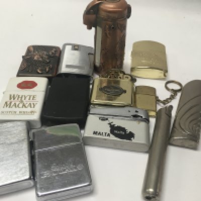 A collection of thirteen cigarette lighters .