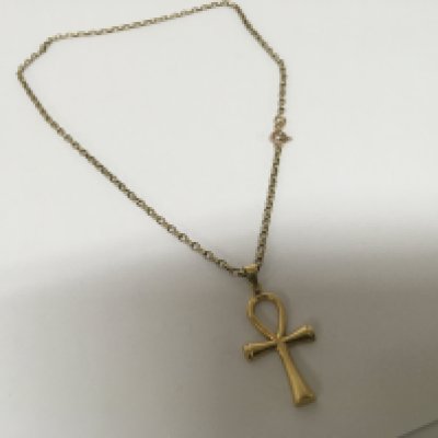 An Egyptian gold cross with attached 9carat gold belcher chain total weight 6g