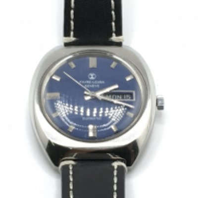 A Favre Leuba day date gents watch. Seen running. Approximately 40mm including crown. Postage B
