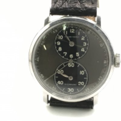 A gents vintage wrist watch by Jean Louis Roehrich who was supposedly worked with Omega and Cartier. Case 34mm. Winds and runs. Postage B