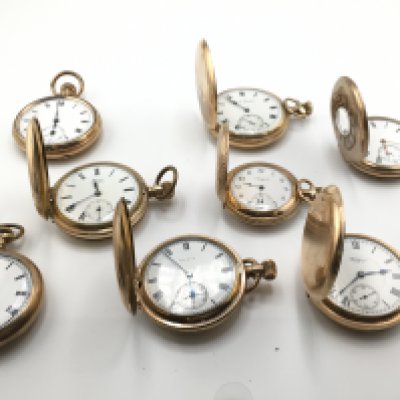 A collection of 8 gold plated hunter and half hunter button wind pocket watches including Waltham and Elgin etc. All wind and seen running.