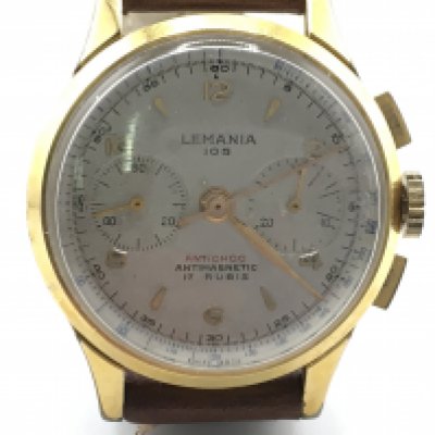 A Lemania 105 gold filled vintage gents watch. 34mm case with brown leather strap. Seen running.