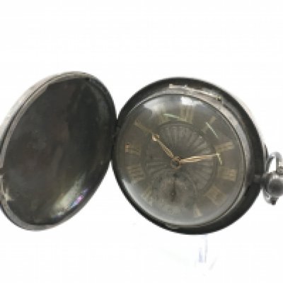 An 1823 silver cased pocket watch. This lot cannot be posted