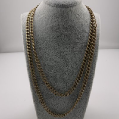 A double link 9ct gold longuard chain, 23.8g. (Plus 5g of scrap 9ct gold)