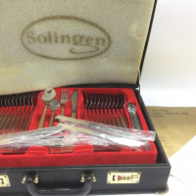 A cased canteen of Solingen gold plated cutlery. Shipping category C.
