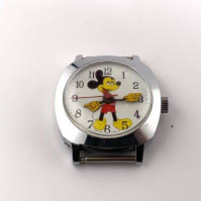A vintage Mickey Mouse wrist watch (A) not in working order.
