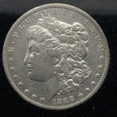 A 1888 Morgan silver dollar, New Orleans mint with a double struck obverse resulting in a doubling up of Lady Liberty&rsquo;s lips, chin and nose (Hot Lips Error pressing). (A)