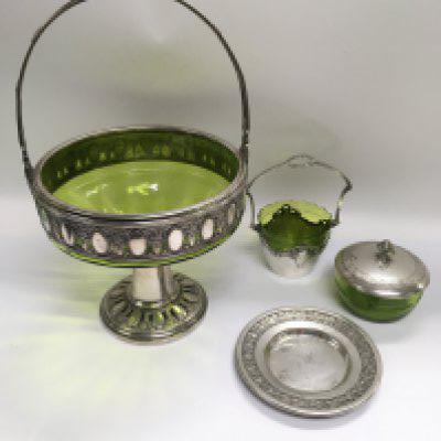 A WMF fruit basket with a green glass liner together with a smaller example, tidy jar and dish (4). Shipping category D