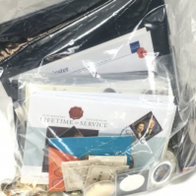 A collection commemorative coins including coin covers and various five pound coins etc. Postage category C