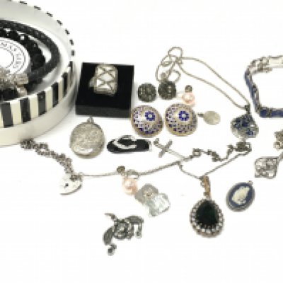 A collection of silver jewellery including necklaces, a ring, pendants, cufflinks. Postage category B