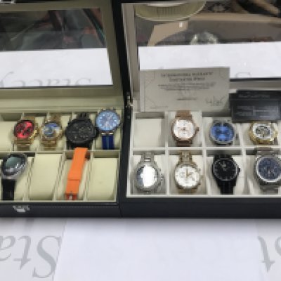 Two watch boxes containing various dress watches including a Constantin Weisz etc. Postage B