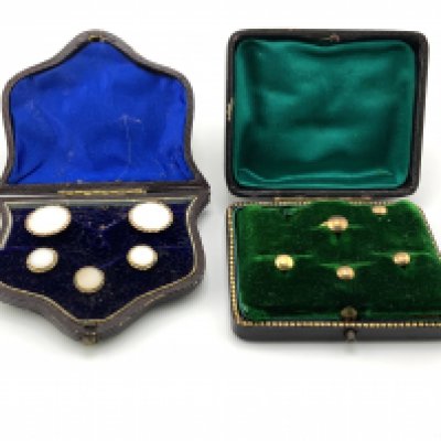 A 9ct gold cased set of collar studs together with a gilt metal and glass stud stud