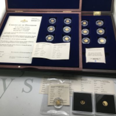 A collection of 16 0.5g 14ct gold coins of various design. Postage B