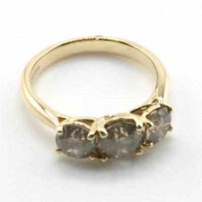 A certificated 18ct yellow gold trilogy ring, diamonds 2.10ct, cert no WGI9624140673. Ring size M, 4.1g. Postage category a