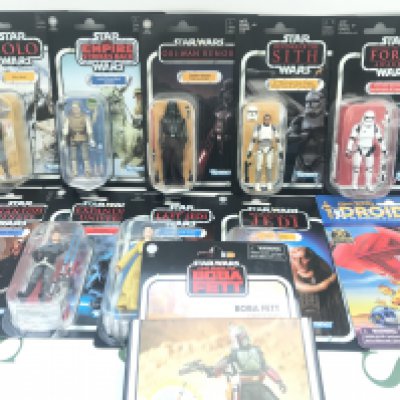 A Collection of Modern Star Wars Carded Figures.