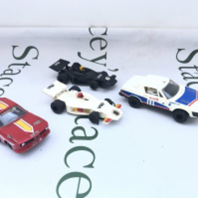 4 Vintage Scalextric Cars And A Collection of Track and Controllers.