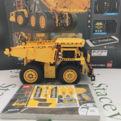 A Lego 6X6 Volvo Truck Articulated Hauler #4211.Has Been Built into A Tipper Truck. With Box And Manual. Appears to Be Complete. This Lot Cannot Be Posted In House. (2).