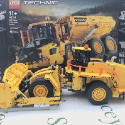 A Lego 6X6 Volvo Articulated Hauler Turned Into A Dozer #42114. With Box And Manual. This Lot Cannot Be Posted In House.(2).