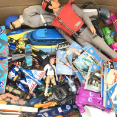 A Box Containing Various Toys And Collectors Cards. including Thunderbirds. Jurassic Park. Star Wars. Etc. No Reserve.