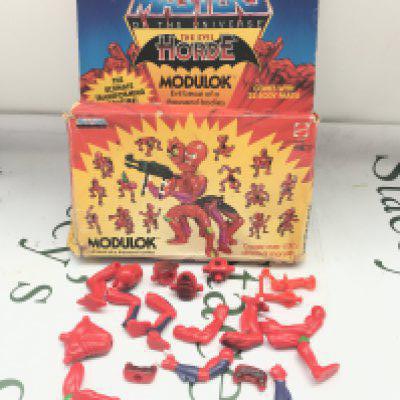 A Boxed Vintage Masters Of The Universe Modulk. Box Is Worn And Parts Missing. No Reserve.