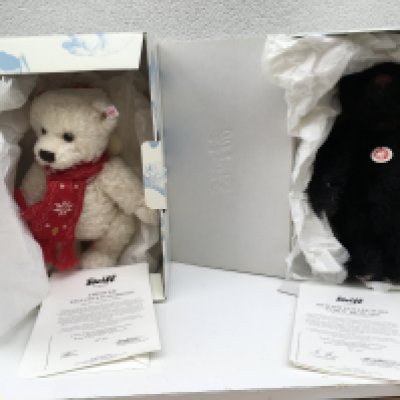 A pair of boxed limited edition Steiff teddy bears each with COA features Chester (32cms) 495 of 1500 and 2011 Black Bear (36cms) 1061 of 2000. Both featuring the Button in Ear and growler. No reserve. (2)