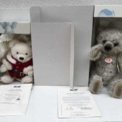 Two boxed Steiff teddy bears each with a COA featuring Santa Claus 2008 (25cms) and Pepe (38cms) 927 of 2011. Both have the Button in Ear. No reserve. (2)