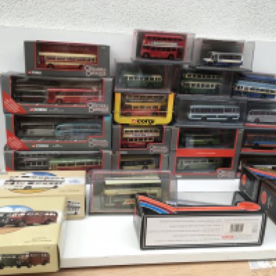 A collection of 25 boxed diecast model vehicles by Corgi and EFE featuring buses. Some limited edition with certificates. No reserve