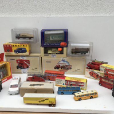 A collection in excess of twenty model vehicles mostly diecast my various manufacturers including Dinky..Corgi plus others. Vehicles include buses..commercial ..fire service and cars. No reserve.