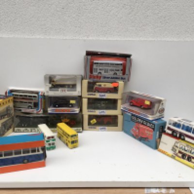 A collection in excess of 12 mostly boxed model diecast vehicles featuring commercials and buses manufacturers include Dinky..Corgi..Tekno.. no reserve